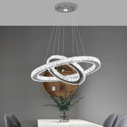 Modern chrome crystal ring chandelier with three interlocking crystal rings pendant light for dining room decorbites decor