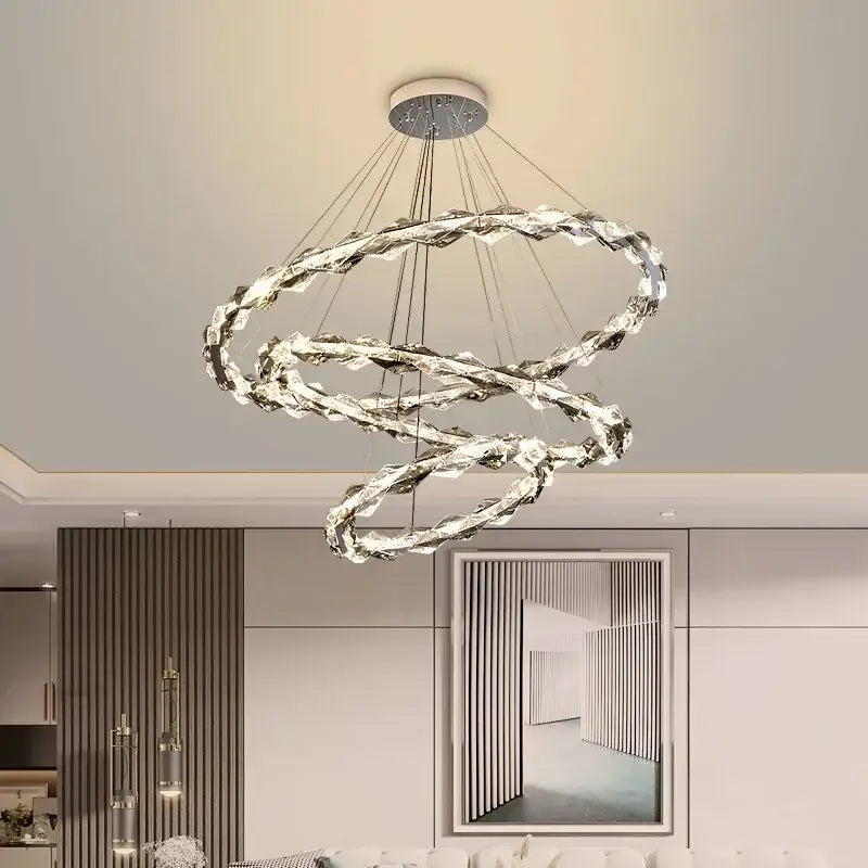 Modern chrome crystal ring chandelier with dimmable led and sleek spiral design for dining room decorbites crystal ring