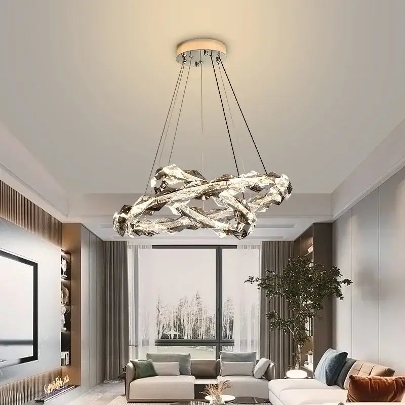 Modern chrome crystal ring chandelier by decorbites with a silver-toned sculptural design for dining room lighting