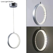 Modern decorbites™ crystal rings led pendant light fixture with sleek chrome finish and circular embedded leds for indoor use