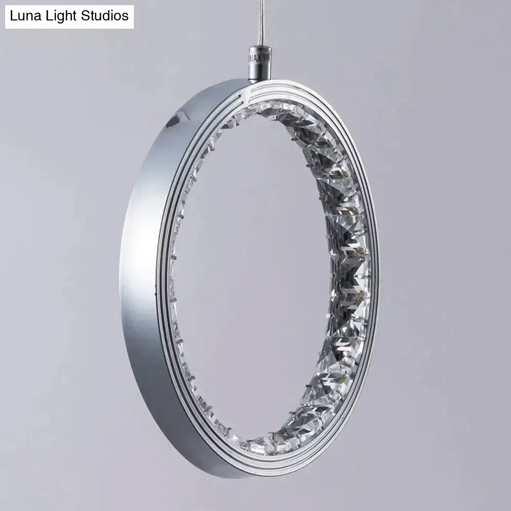 Silver oval pendant light with sleek metallic frame and embedded crystal rings led for bedroom and dining room decor