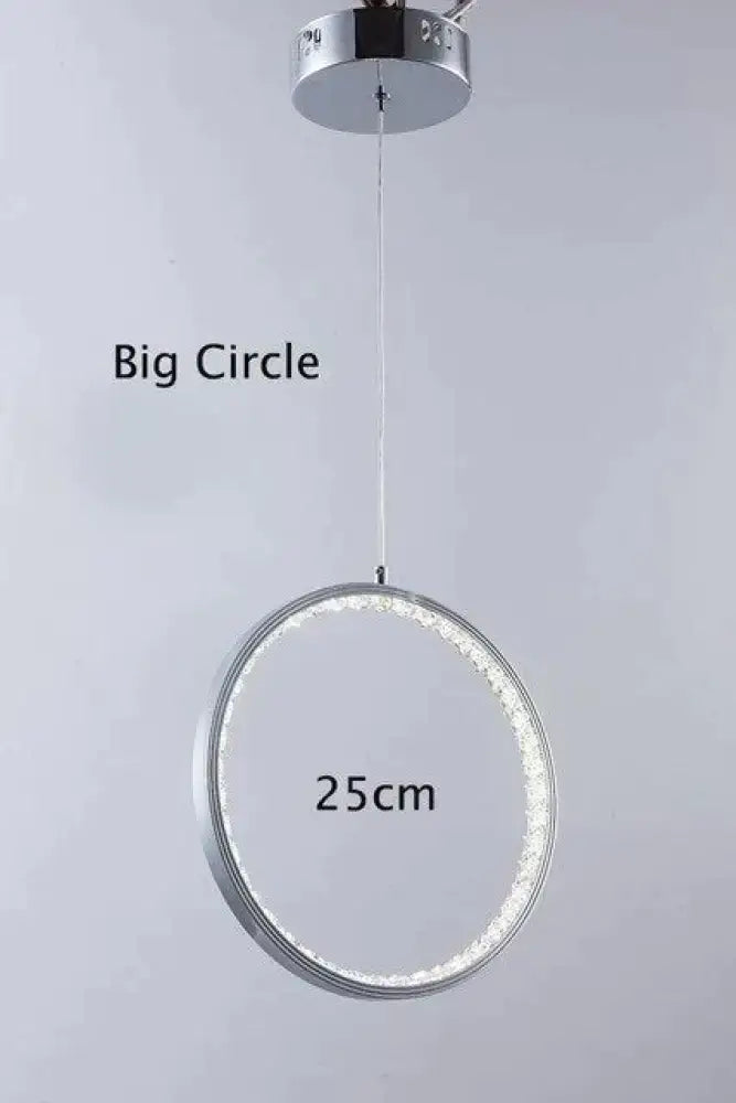 Decorbites crystal rings led pendant light features a 25cm chrome circle with sparkling crystal rings for indoor use