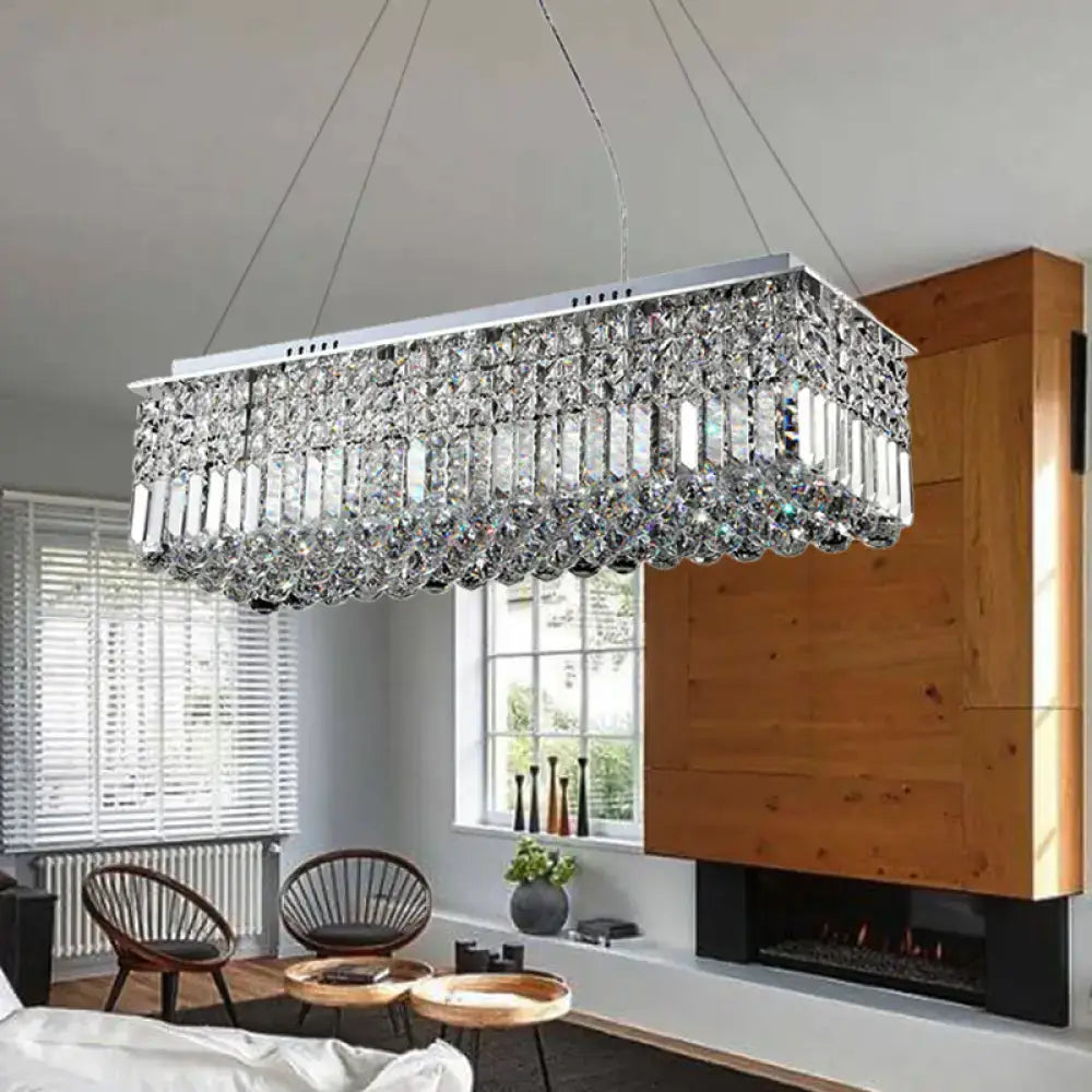 Decorbites modern chrome chandelier with crystal shade featuring clear faceted glass prisms for living room ceiling