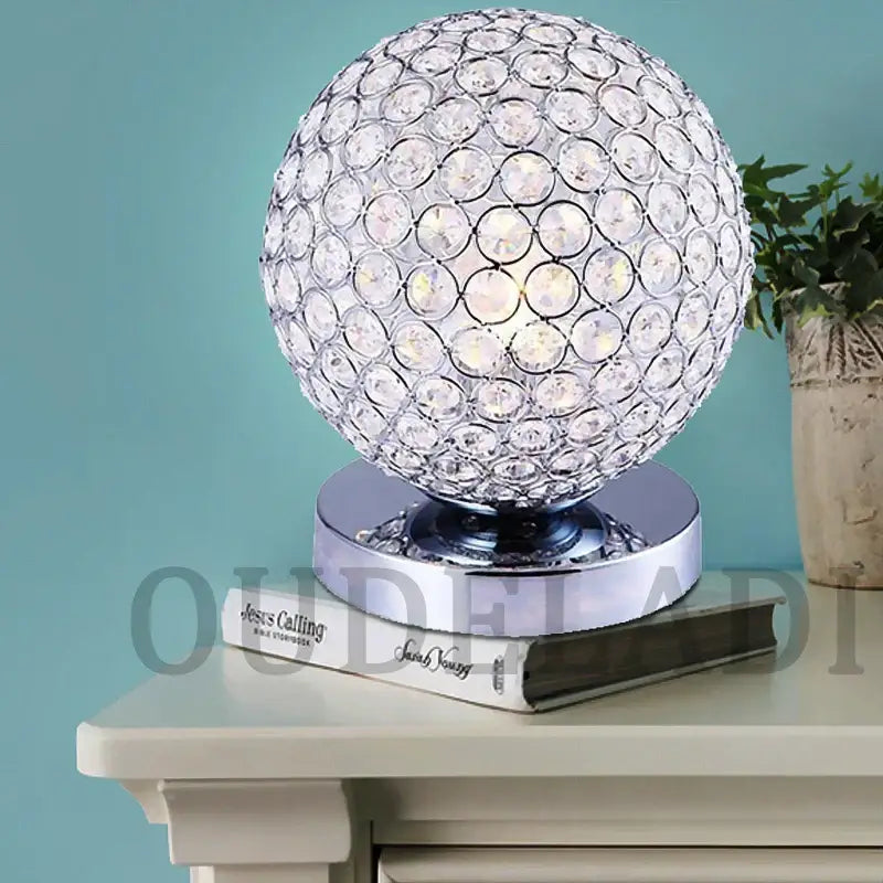 Modern chrome crystal table lamp with faceted clear stones in a spherical design for bedroom decorbites crystal table use