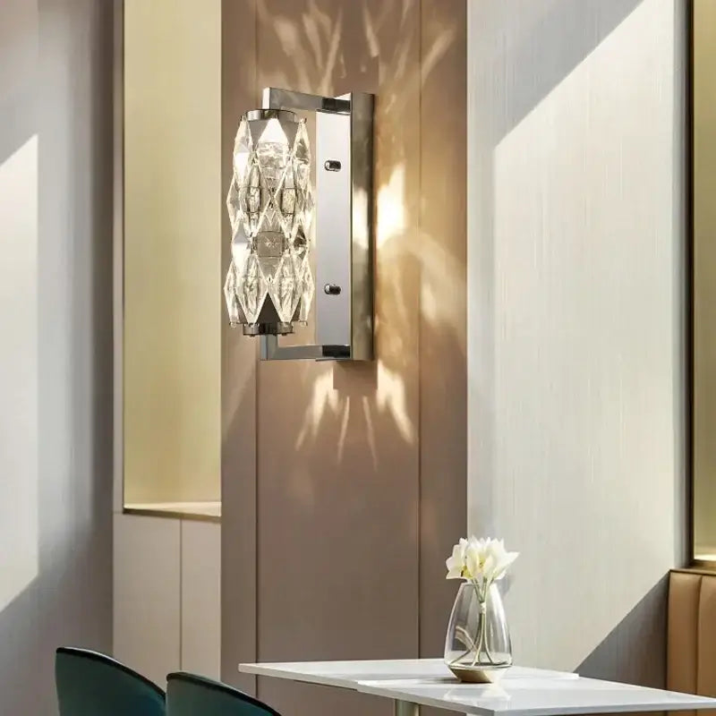 Modern chrome crystal wall lamp with crystal-encrusted design and sleek chrome frame for luxury bedroom lighting decorbites wall lamp