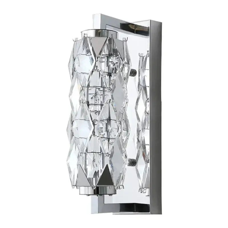 Modern chrome crystal wall lamp featuring cascading faceted crystal elements for luxury bedroom lighting decorbites crystal wall