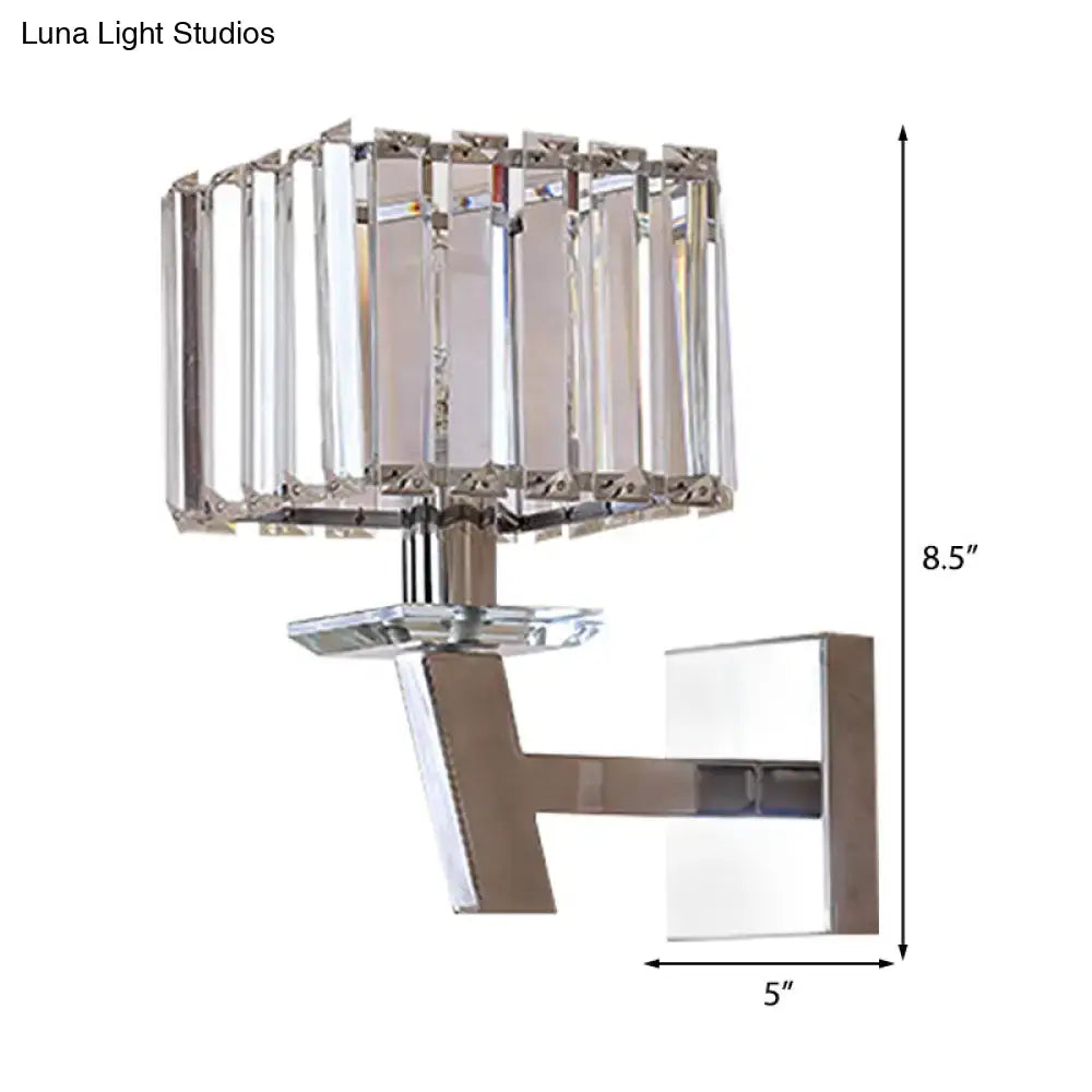 Modern chrome crystal wall light with vertical faceted glass panels and direct wired electric power source design
