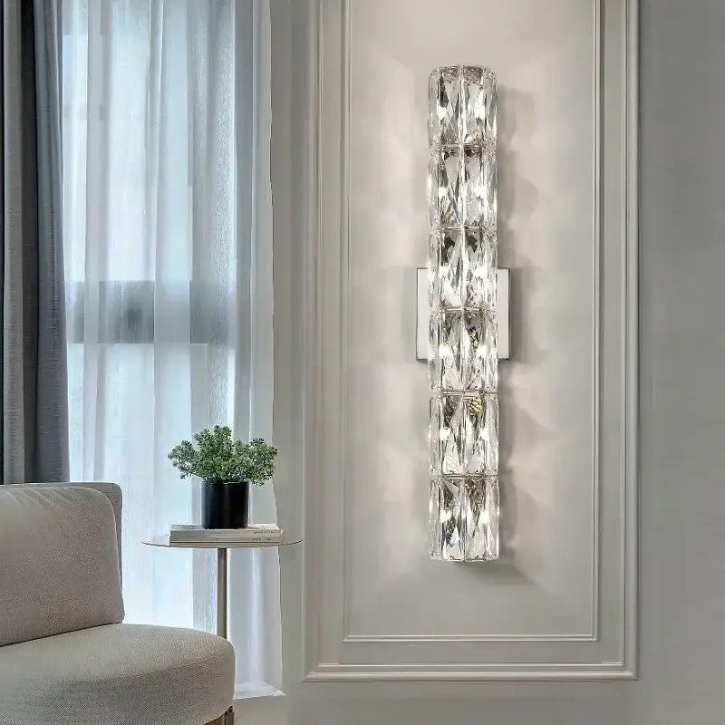 Modern chrome crystal wall light featuring stacked faceted glass segments and polished silver accents for luxury decorbites crystal wall lighting