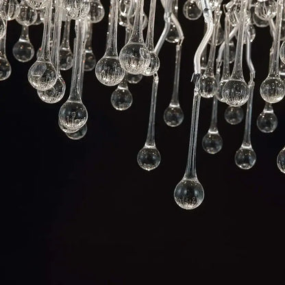 Modern chrome crystal water drop branch chandelier with clear glass teardrop elements and subtle internal ridges