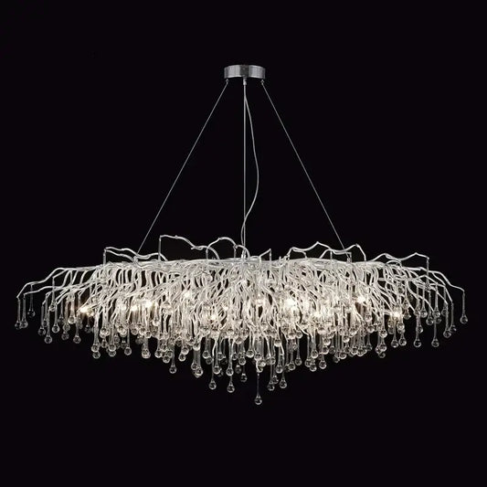 A modern chrome crystal water drop branch chandelier with glass arms and crystal droplets for living room light