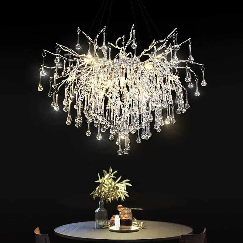 Modern chrome crystal water drop branch chandelier with intricate arms and teardrop-shaped glass for living room light