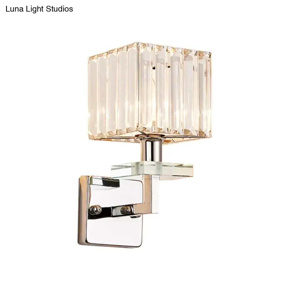 Modern chrome cuboid crystal wall mounted light with square faceted shade and polished chrome hardware for bedroom use