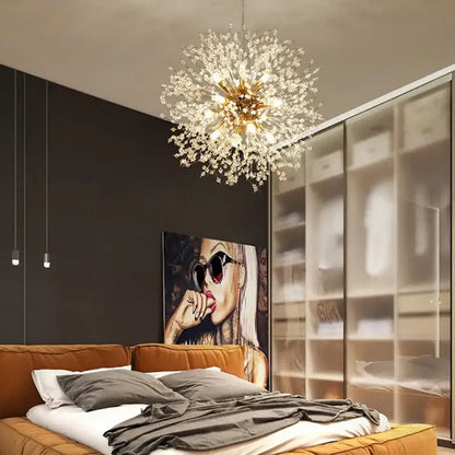 Modern chrome pendant light with gold-toned starburst design featuring clear acrylic beads for bedroom decor
