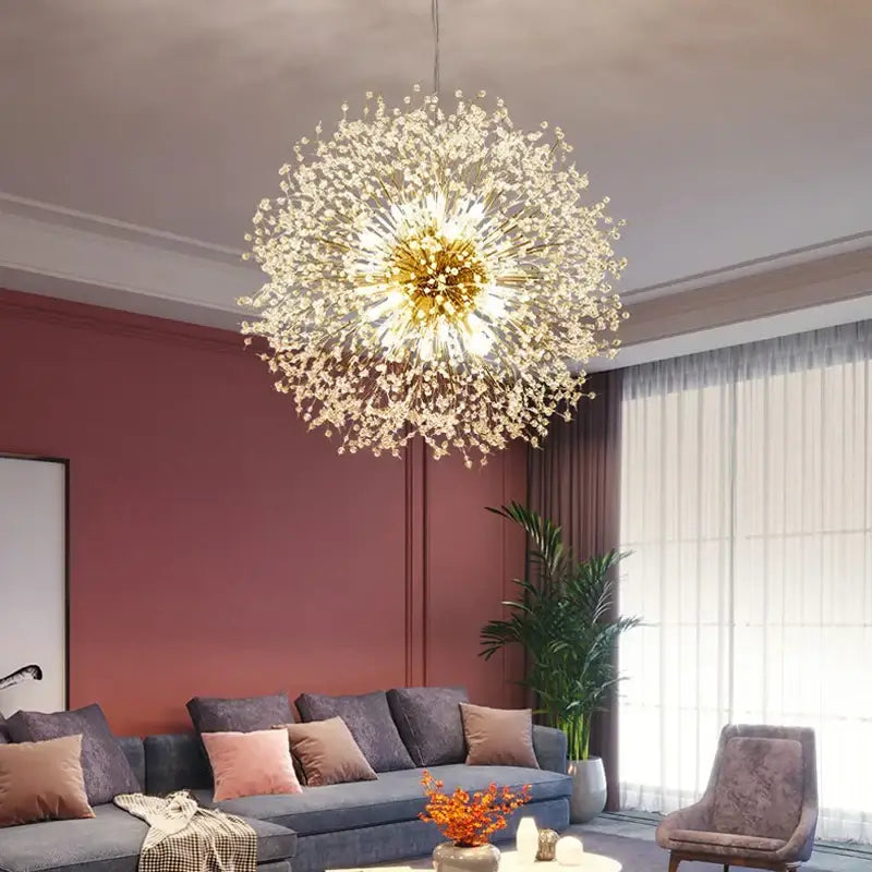 Modern chrome pendant light with golden spherical design and clear acrylic beads radiating like a burst of light