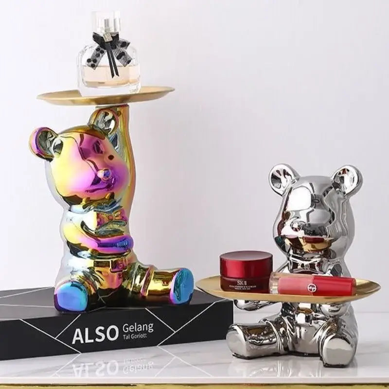 Iridescent ceramic decorbites bear doll on gold tray holding perfume bottle for bear doll storage and living room use