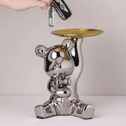 Modern chrome decorbites bear doll key holder with shiny chrome finish and gold doll storage tray on raised paw