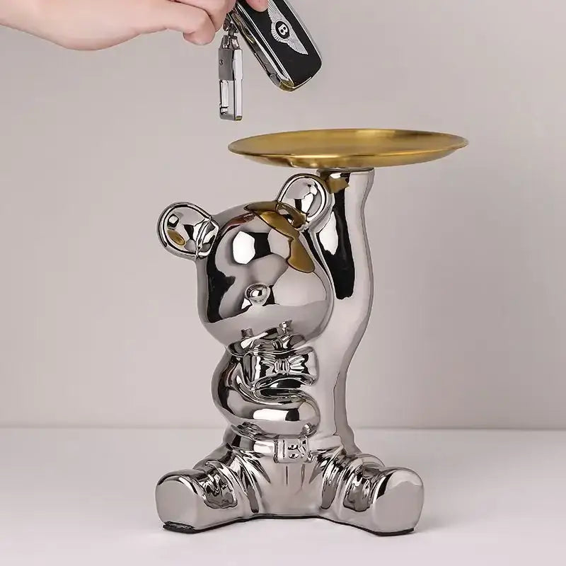 Modern chrome decorbites bear doll key holder with shiny chrome finish and gold doll storage tray on raised paw
