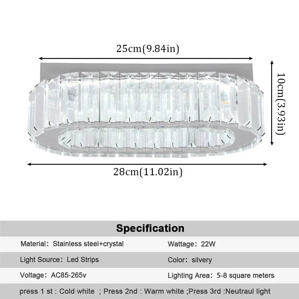 A modern oval decorbites crystal ceiling chandelier with silver chrome finish and clear crystal accents for living room