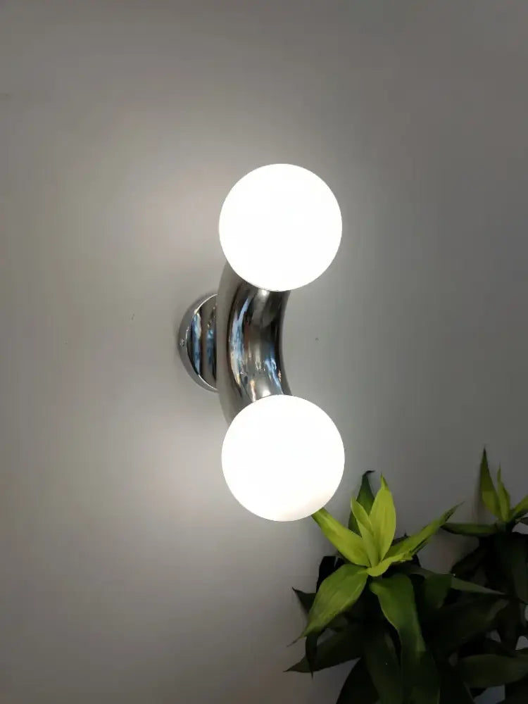 Modern chrome designer grape wall sconce with two white glass bulbs for bedroom decorbites designer grape lighting