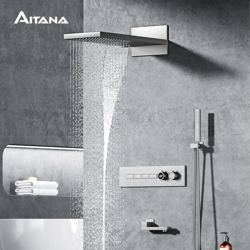 Aitana modern chrome digital rainfall shower system with sleek rectangular showerhead and integrated wall-mounted control panel