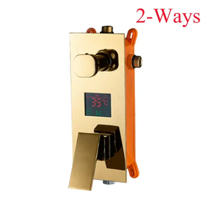 Gold-colored modern digital triple mixer valve shower faucet with sleek rectangular design and orange side handle
