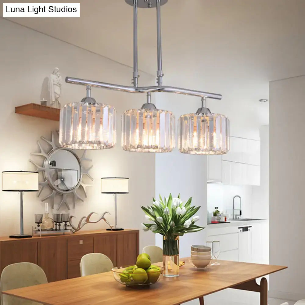 DecorBites modern chrome pendant light with three cylindrical crystal shades for dining room island lighting