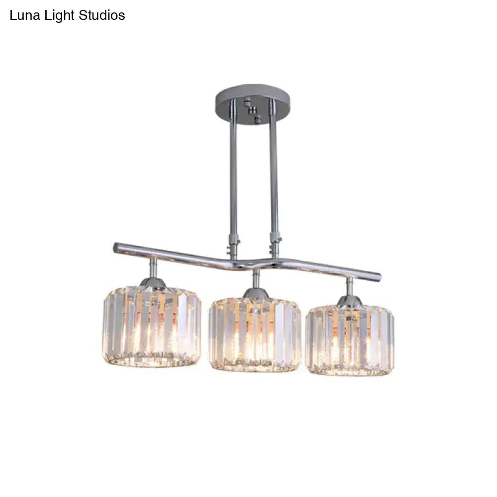Decorbites modern chrome pendant light with three cylindrical crystal shades featuring vertical faceted cuts for dining room island