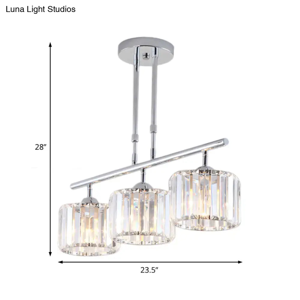 Modern chrome drum pendant light with three cylindrical crystal shades designed for bedroom lighting
