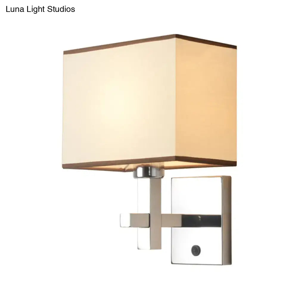 Modern chrome fabric led wall sconce with cream shade and polished metal frame direct wired electric lighting fixture