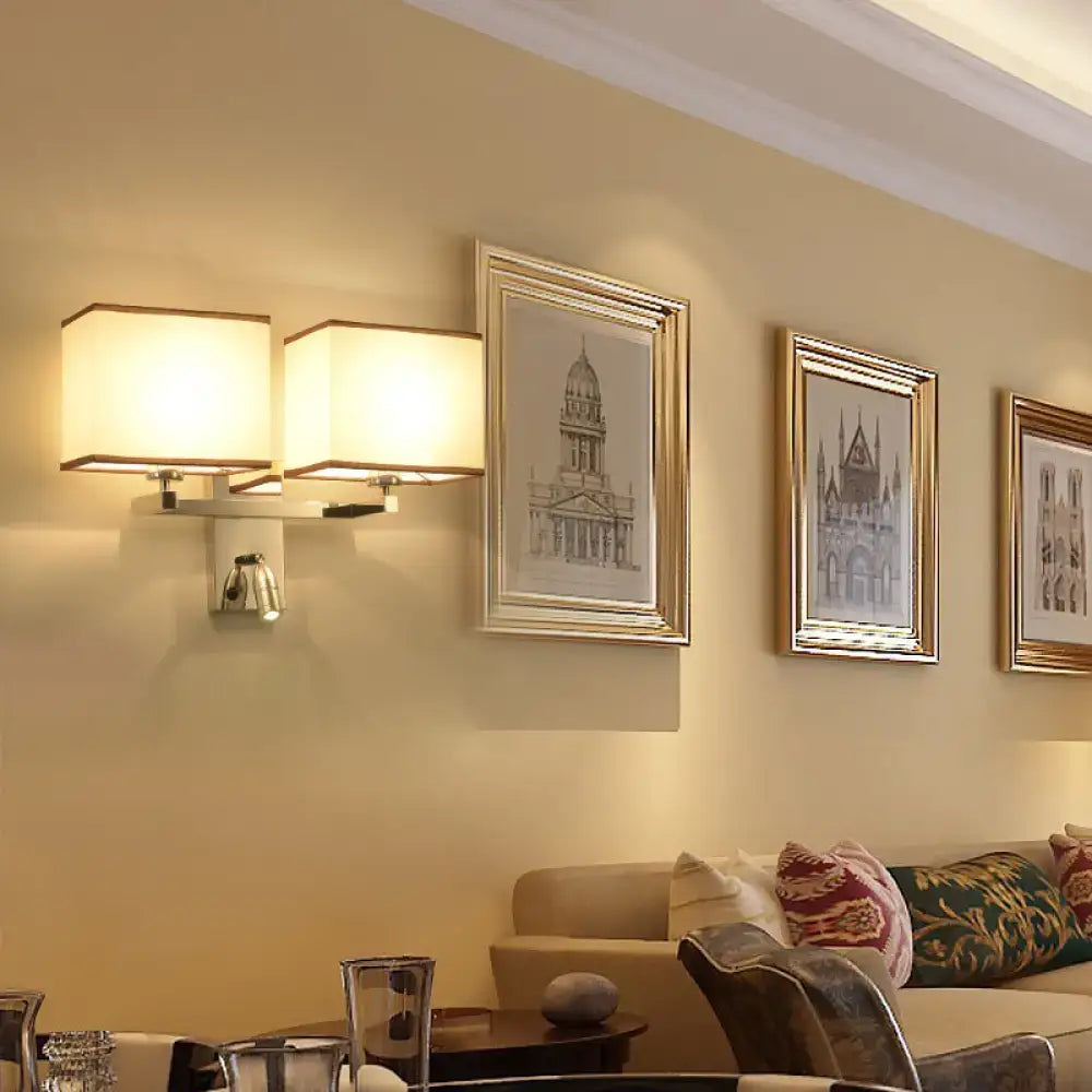 Modern chrome fabric led wall sconce with rectangular cream shades and sleek metallic base direct wired electric lighting fixture inches width