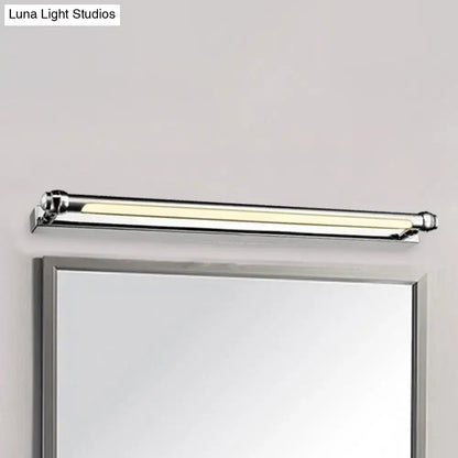 Modern chrome finish led vanity lamp with white color temperature mounted above bathroom mirror handle