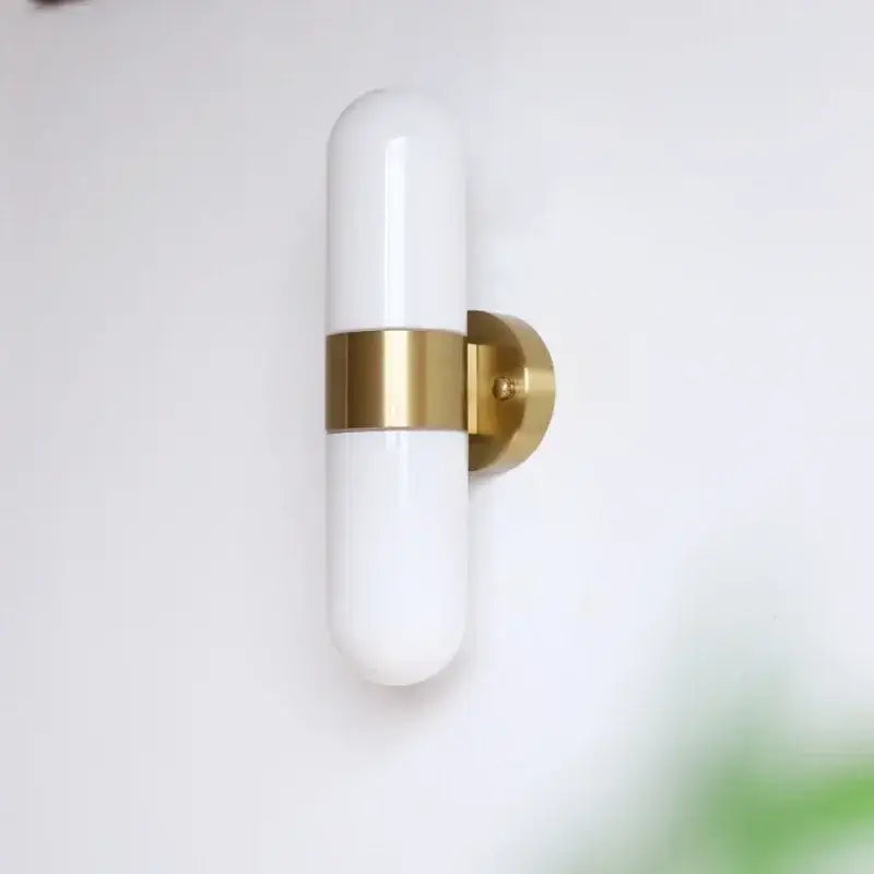 Modern chrome frosted glass vanity mirror light with white frosted glass sconce and gold-toned metal band