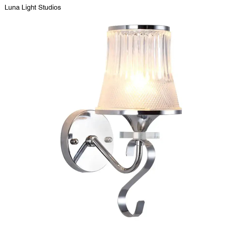 A sleek modern chrome wall light fixture with a ribbed frosted glass shade for LED incandescent fluorescent bulbs