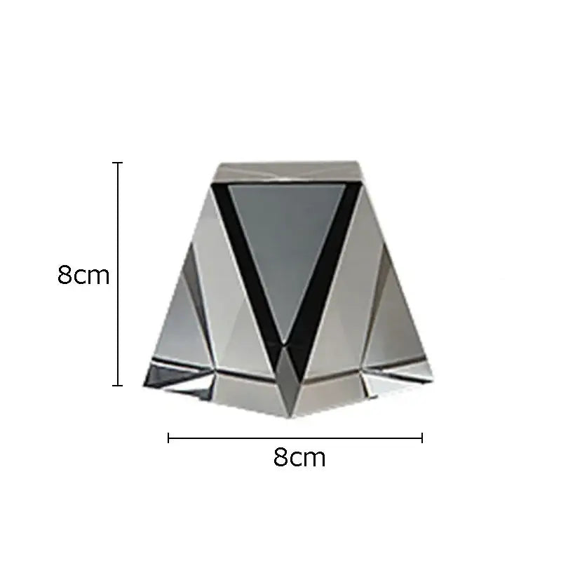 Modern chrome geometric crystal artwork polyhedron bookends with faceted silver metallic finish and black triangular accent
