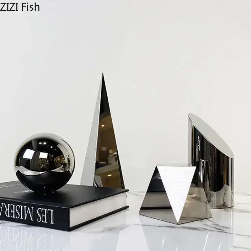 Modern chrome geometric crystal artwork polyhedron bookends with shiny reflective surfaces for living room decorbites geometric crystal decor