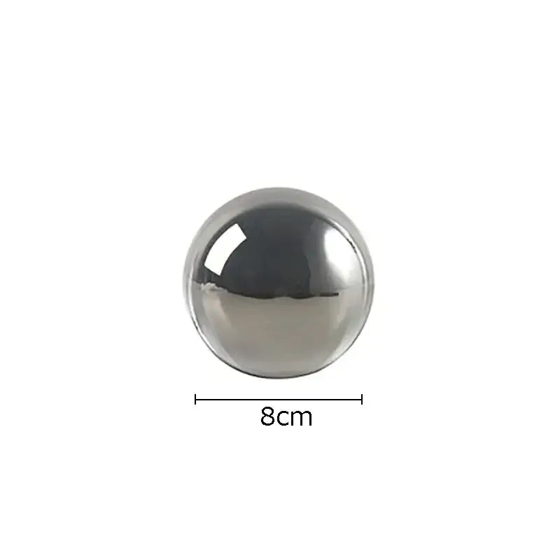 Modern chrome geometric crystal artwork polyhedron bookend featuring an 8cm polished metallic sphere with reflective chrome finish