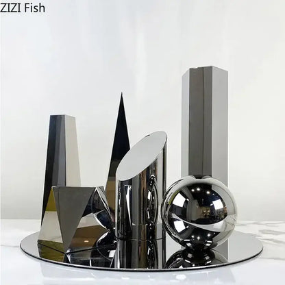 Modern chrome geometric crystal artwork polyhedron bookends with reflective sphere and prisms on mirrored base for decorbites geometric crystal decor