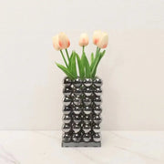 A modern chrome geometric crystal ball glass vase made of reflective spheres for living room decor