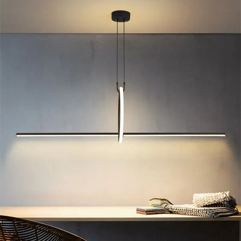 Modern chrome geometric led pendant light featuring a sleek black minimalist curved led strip with thin cables for dining room decorbites geometric led pendant
