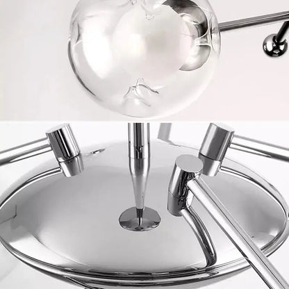 Modern chrome glass ball led chandelier features a spherical chrome lamp with polished metallic base and slender rods for decorbites glass ball led decor