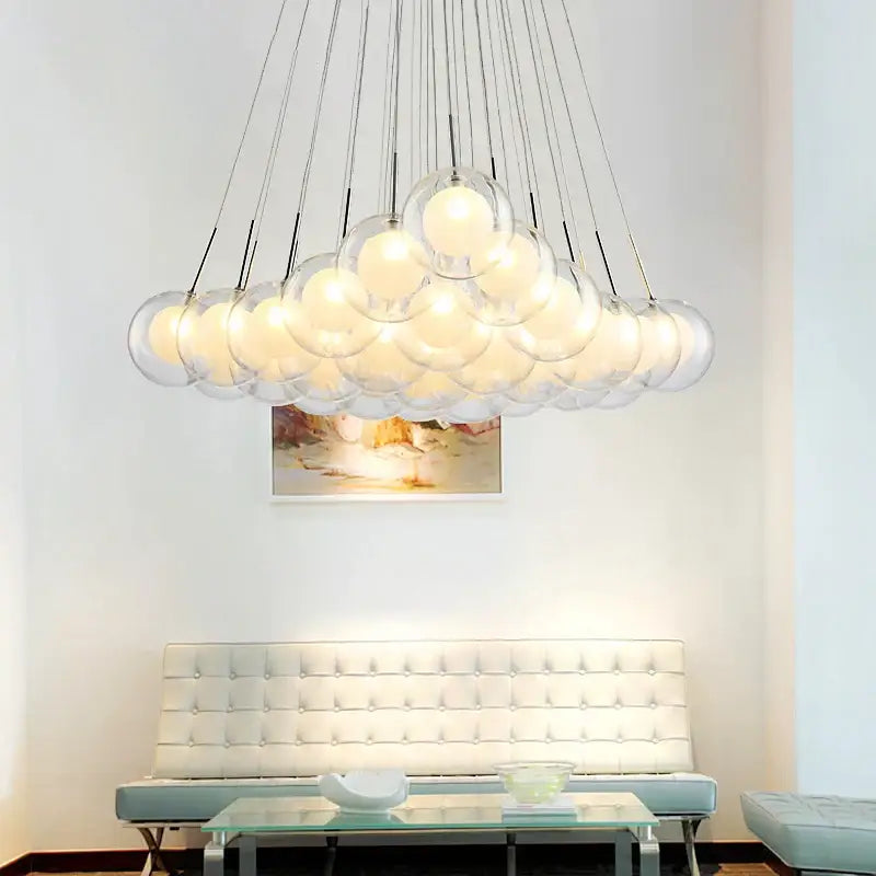 Modern chrome glass ball LED chandelier with clear glass spheres and metallic suspension wires for living room decorbites glass ball
