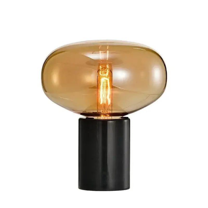 Modern chrome glass ball marble desk lamp with a warm amber filament bulb and matte black base for stylish decorbites glass ball lighting
