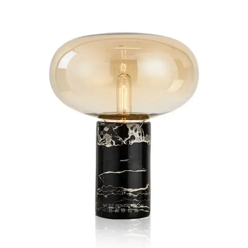 Modern chrome glass ball marble desk lamp with translucent amber dome and black marble base for elegant bedroom decorbites glass ball