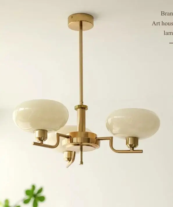 Brass-finished ball pendant chandelier with three opalescent glass shades for modern decorbites glass ball lighting
