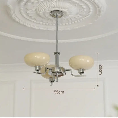 Modern chrome glass ball pendant chandelier with cream-colored glossy glass globe and three arms for bedroom decorbites glass ball