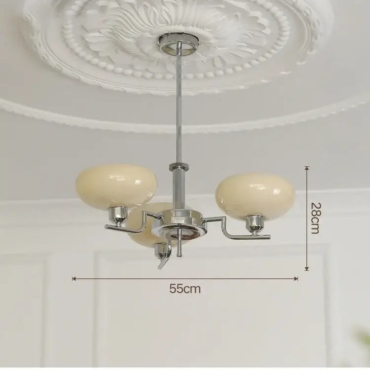 Modern chrome glass ball pendant chandelier with cream-colored glossy glass globe and three arms for bedroom decorbites glass ball