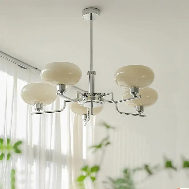 Modern chrome glass ball pendant chandelier with cream-colored oval glass shades for bedroom decorbites glass ball
