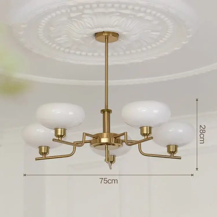 Gold-toned ball pendant chandelier with five frosted white glass shades for bedroom decorbites glass ball pendant