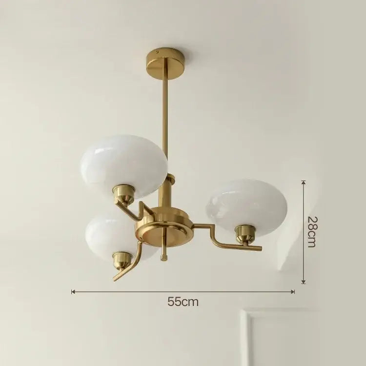 Gold-toned glass ball pendant chandelier with three frosted glass globe shades for modern bedroom decorbites glass ball