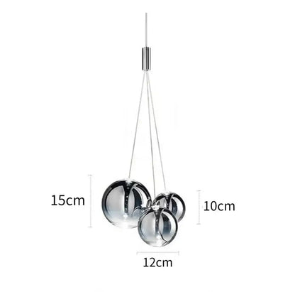 Modern chrome glass ball pendant light fixture with three interconnected glass orbs for dining room decorbites pendant light